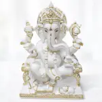 White marble Ganesh Ji moorti with gold detailing for home temple and pooja room