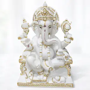 White marble Ganesh Ji moorti with gold detailing for home temple and pooja room