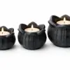 Set of three black marble lotus tealight candle holders in 4, 3 and 2 inch sizes