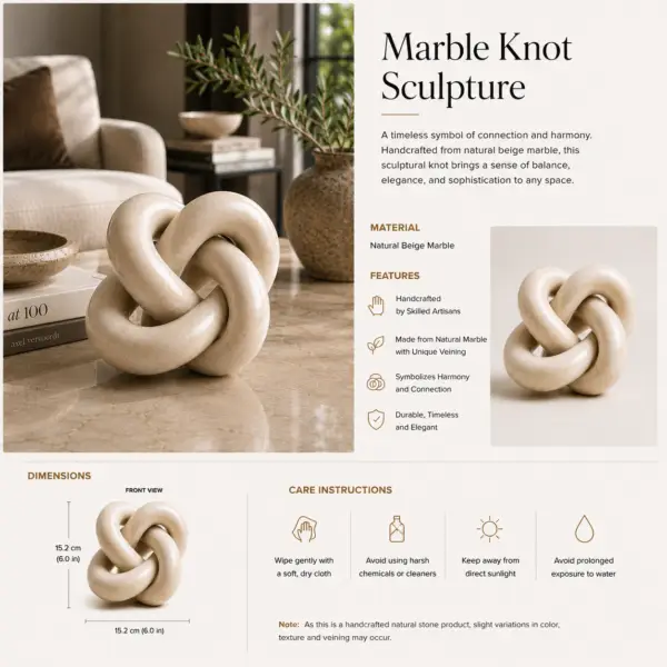 Beige marble knot sculpture styled on a coffee table in a luxury living room setting.