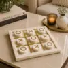 Marble tic tac toe game set showing dimensions, material, features, and care instructions.